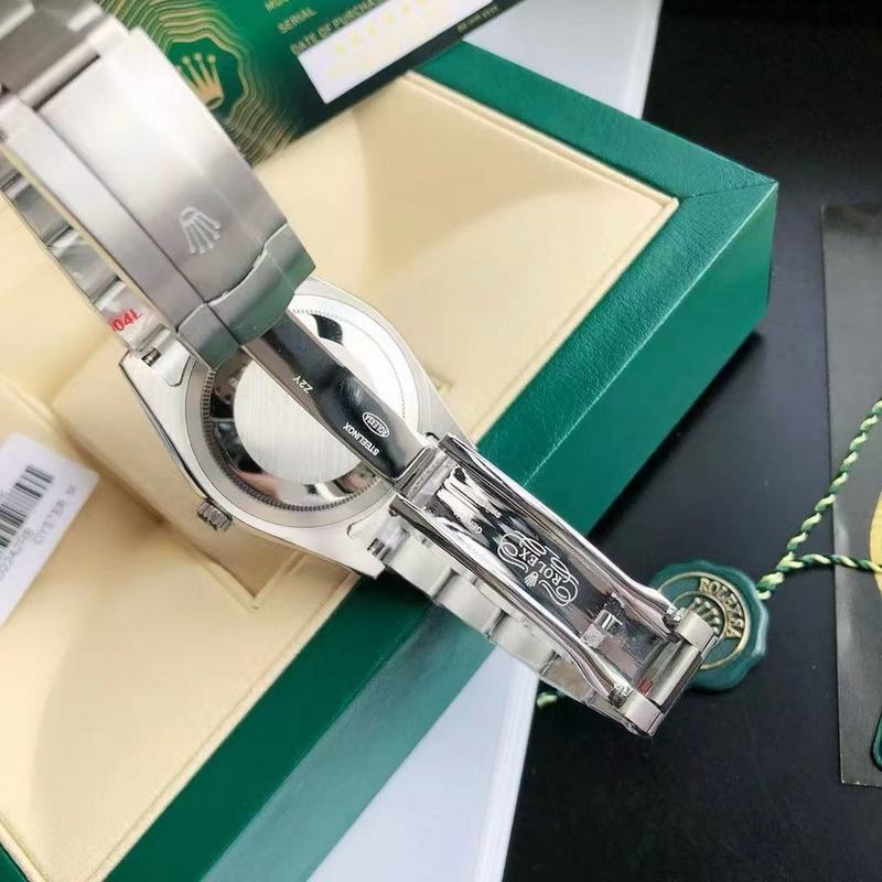 Rolex Oyster Perpetual 39 With Red Grape Dial Watch