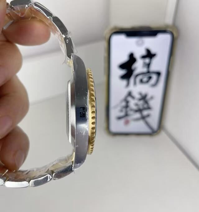 Rolex Stainless Steel and 18k Yellow Gold Submariner Date Black Dial Watch