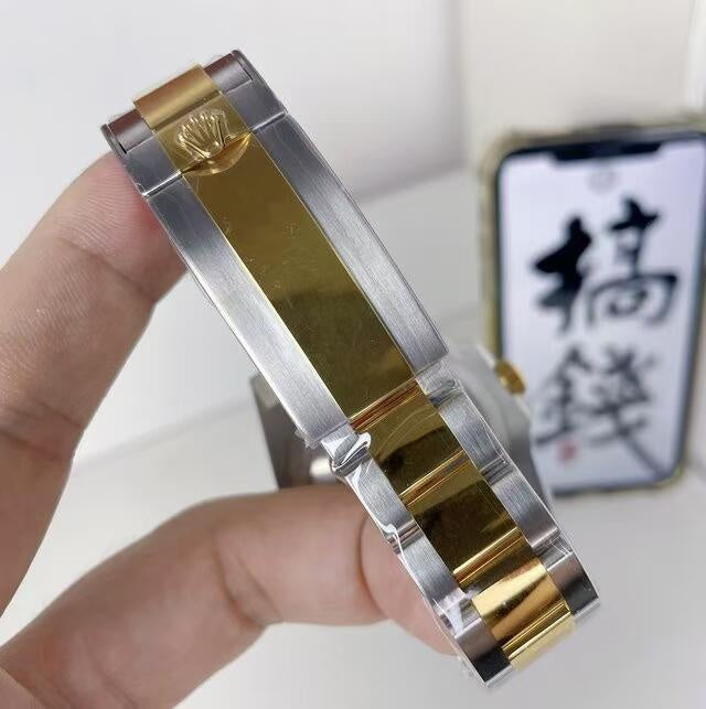 Rolex Stainless Steel and 18k Yellow Gold Submariner Date Black Dial Watch