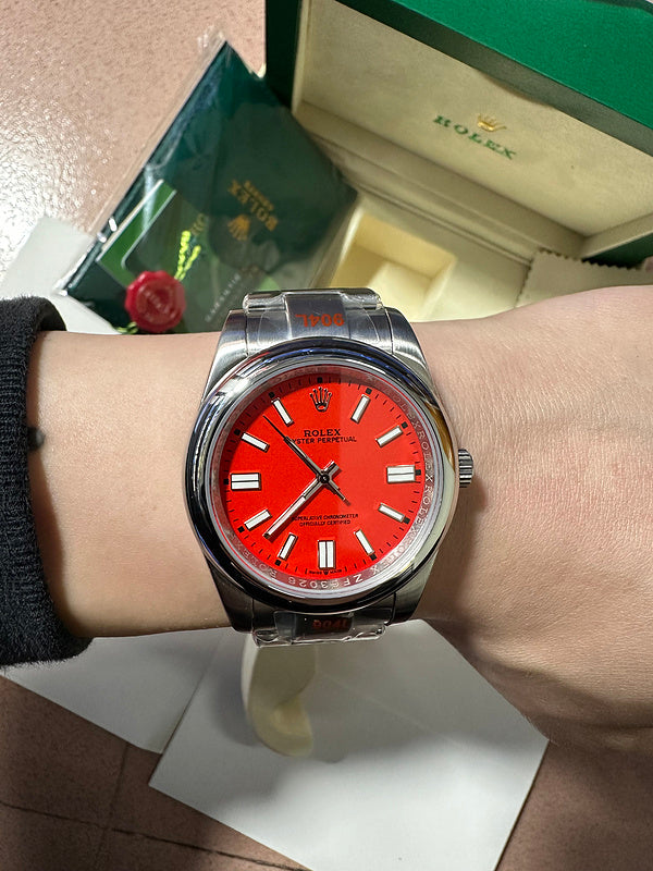 Rolex Oyster Perpetual 41 with Coral Red Dial Watch