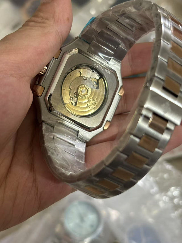 Patek Philippe 5821/1AR Cubitus Rose Gold and Steel 'Sunburst Blue Dial