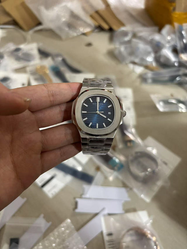Patek Philippe Nautilus Stainless Steel Case & Distinctive Blue Dial Watch